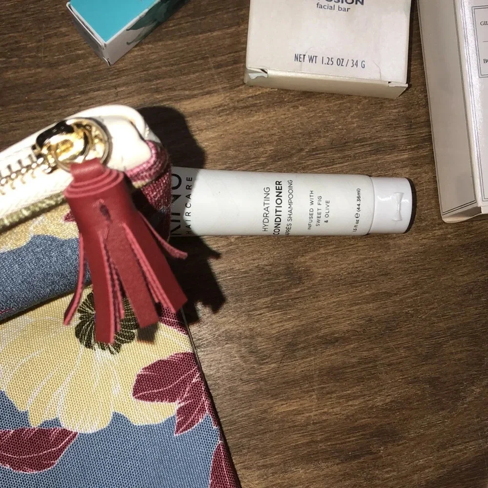 RACHEL Pally floral clutch with beauty samples